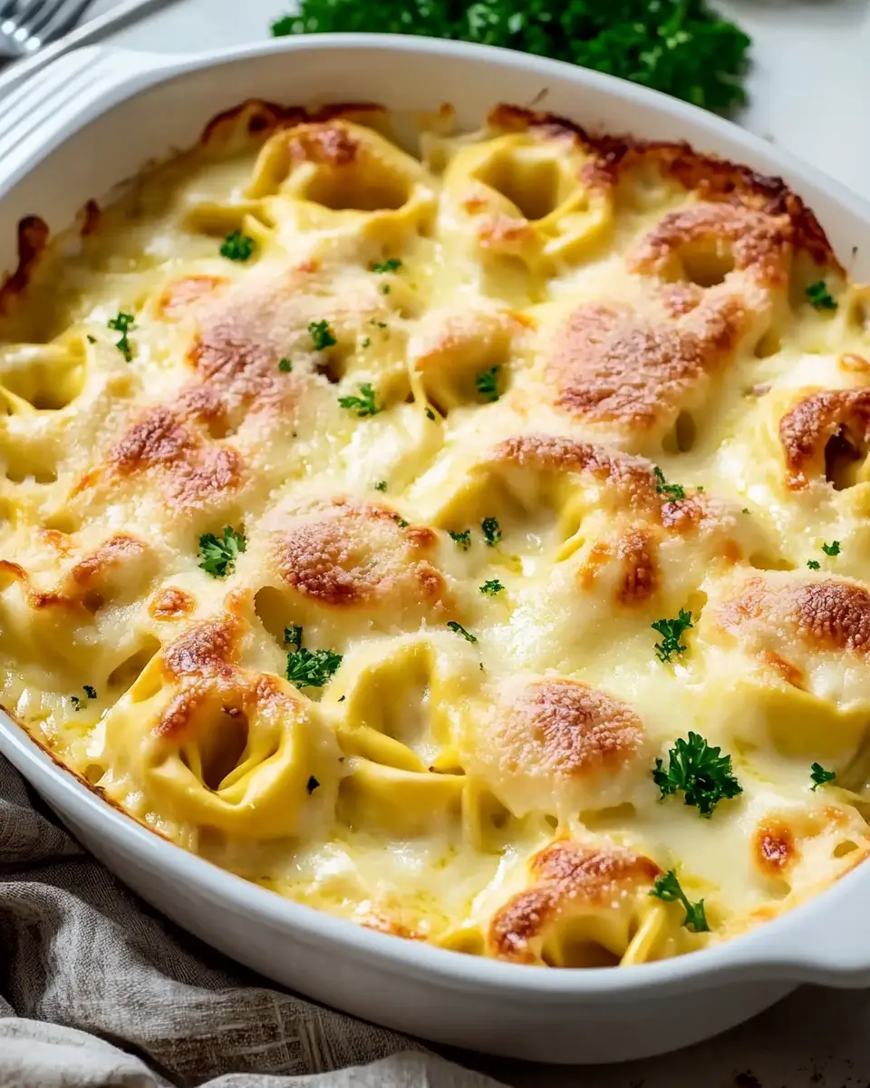 Tortellini Auflauf mit Käse-Sahne-Soße: Cremiger Genuss aus dem Ofen First Image First Image